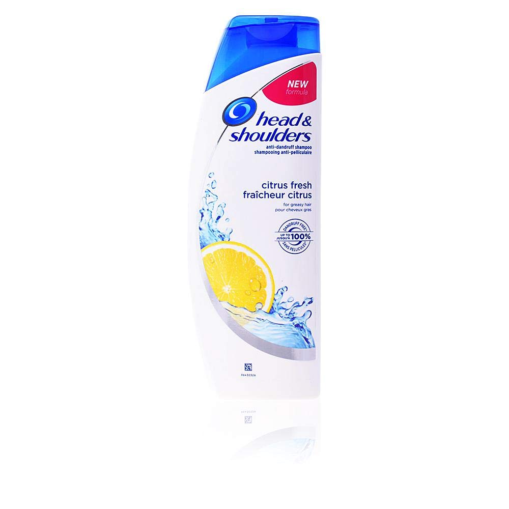 Head & Shoulders Citrus Fresh bottle pouring, refreshing cleanse helps with flakes.