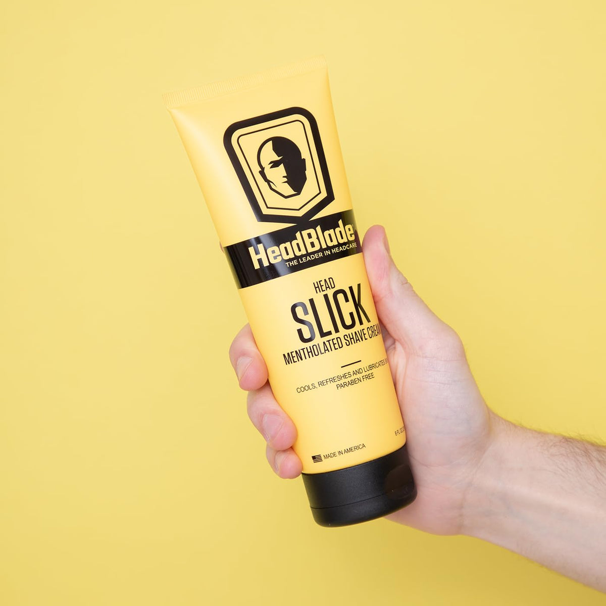 HeadSlick cream lather-application shows easy lather for a comfortable scalp shave.