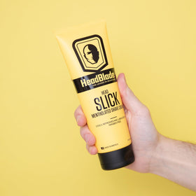 HeadSlick cream lather-application shows easy lather for a comfortable scalp shave.