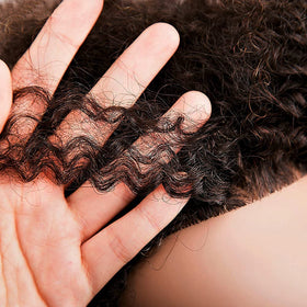 Headdoll Afro curly mannequin head features realistic texture and 9-inch length.