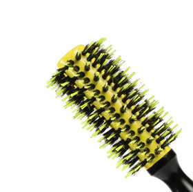 Healthcom yellow ergonomic handle brush ready for comfortable styling sessions.