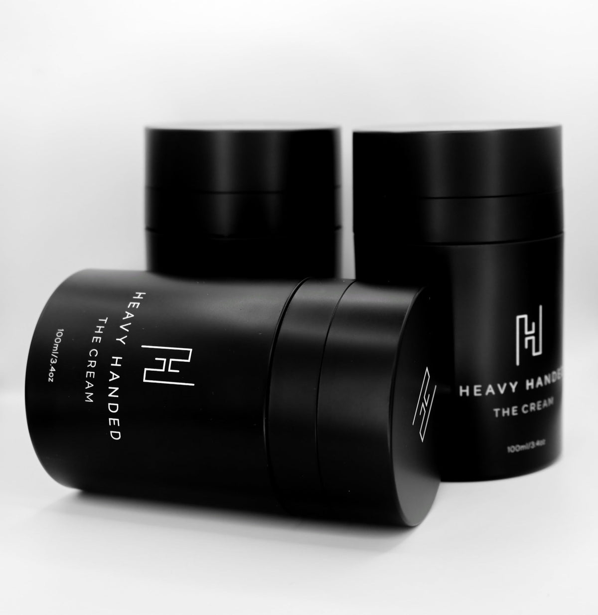 Heavy Handed The Cream bottle close-up highlights fast-absorbing hand care.