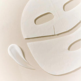 Hebestem sheet mask on skin showing radiant, refreshed look.