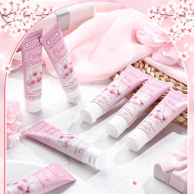 Heigble cherry blossom jojoba lotion packaging with pink-white color scheme.