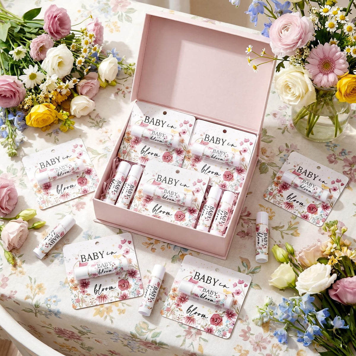 Heigble pink wildflower design label on lip balm packaging.