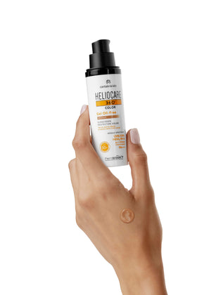 Swatch on forearm showing bronze tint and smooth blend