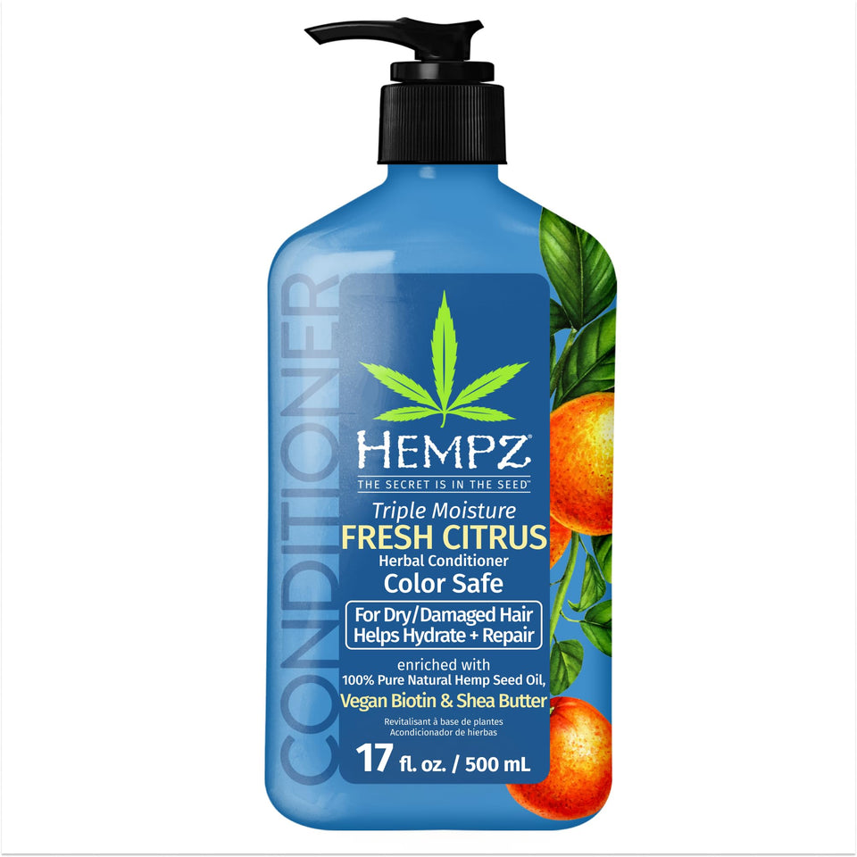 Hempz Biotin Conditioner bottle shows color-safe hydration for dry, damaged hair.