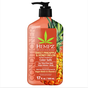 Hempz Biotin Conditioner bottle closeup showing nourishing hydration for fine hair.