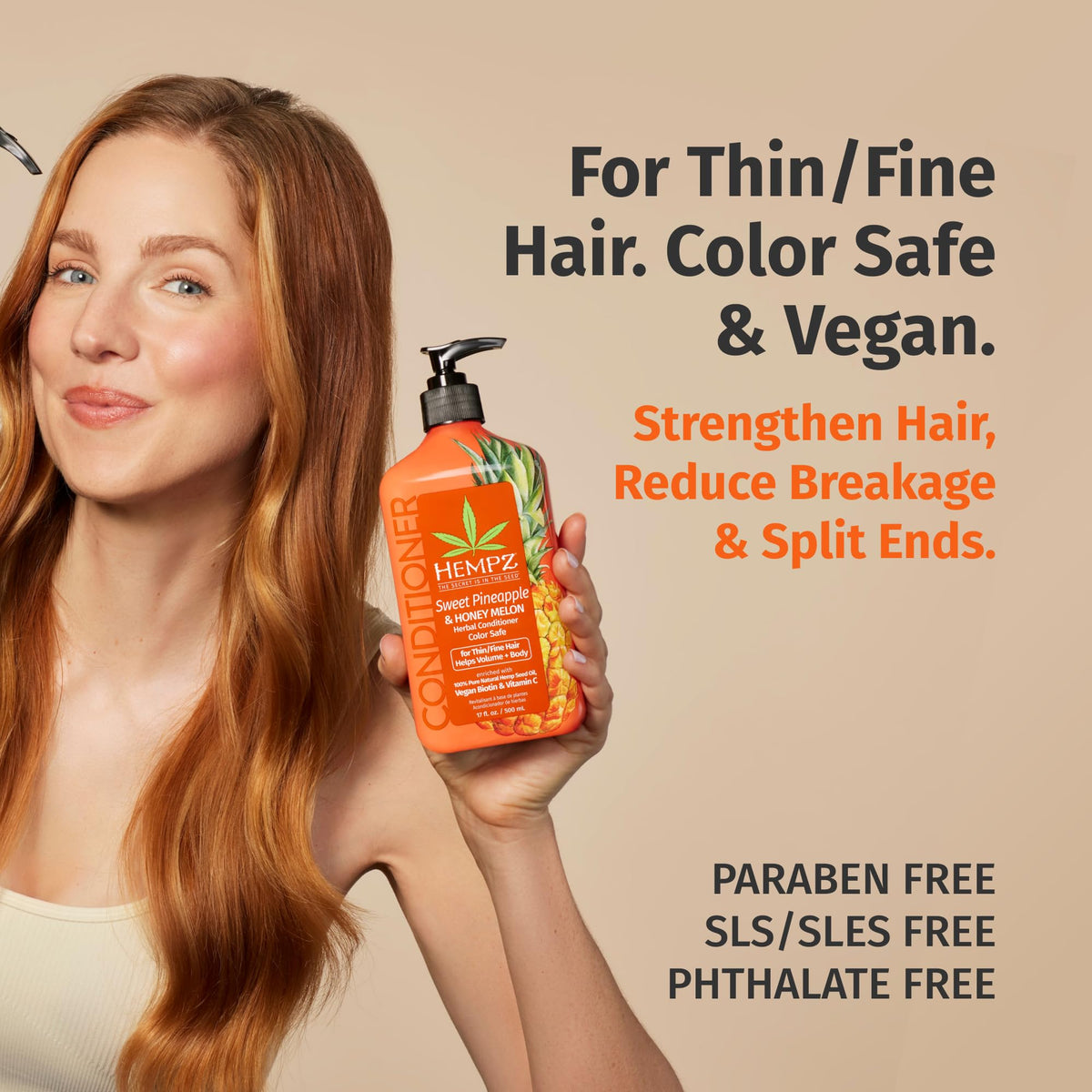 Hempz Biotin Conditioner label closeup with Sweet Pineapple & Honey Melon scent for refreshment.