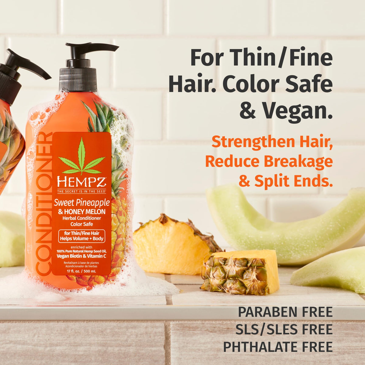 Hempz Biotin Conditioner hair texture close-up showing smooth, shiny strands.