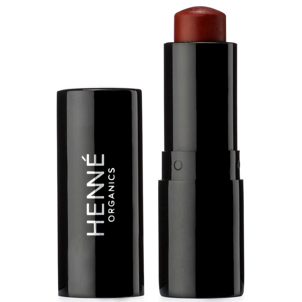Henné Organics Lip Tint Intrigue brick red swatch showing natural moisture