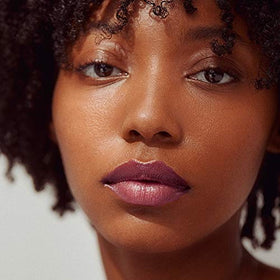 Close-up Muse Berry Mauve texture shows creamy, non-sticky finish.