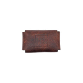Henson Shaving brown leather head cover open, shows interior protection for your razor.