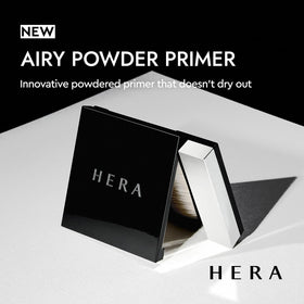 Close-up of HERA Airy Blurring Primer texture reveals fine clay powder.