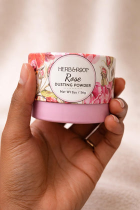 Herb & Root Rose Dusting Powder in travel-size packaging for gym bags.
