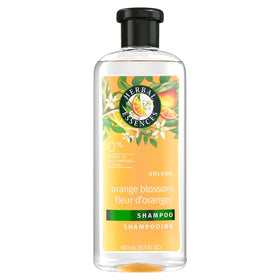 Herbal Essences Orange Citrus Blossoms shampoo bottle front showing volumizing action and fresh scent