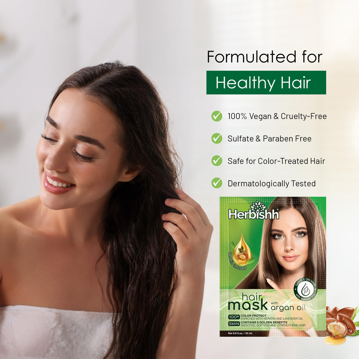 Herbishh Argan Hair Mask applying on towel-dried hair