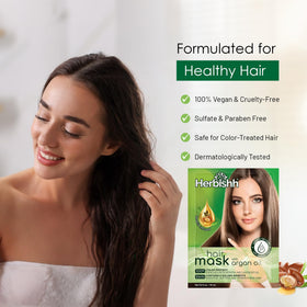 Herbishh Argan Hair Mask applying on towel-dried hair