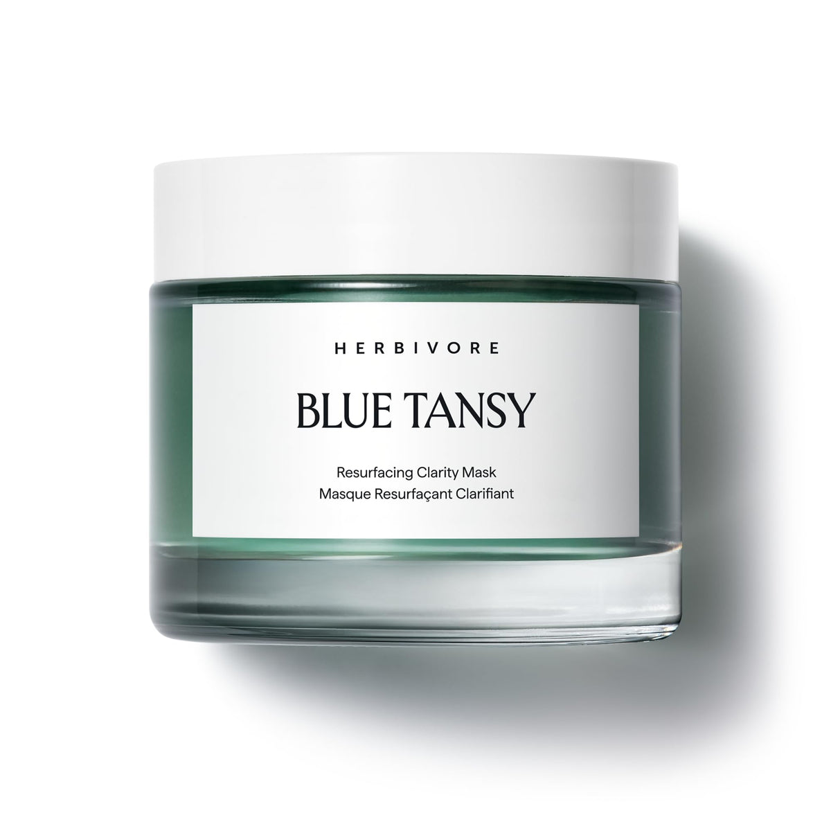 HERBIVORE Blue Tansy Resurfacing Mask jar shows gel texture for pore refinement.