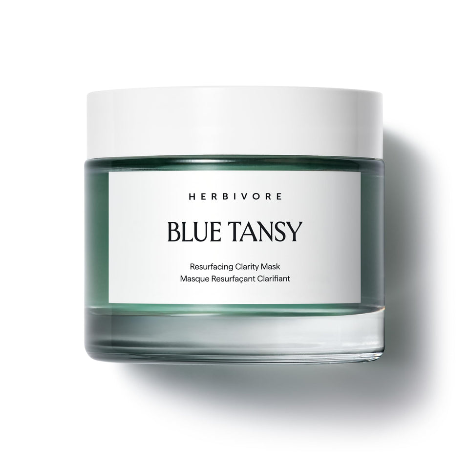 HERBIVORE Blue Tansy Resurfacing Mask jar shows gel texture for pore refinement.
