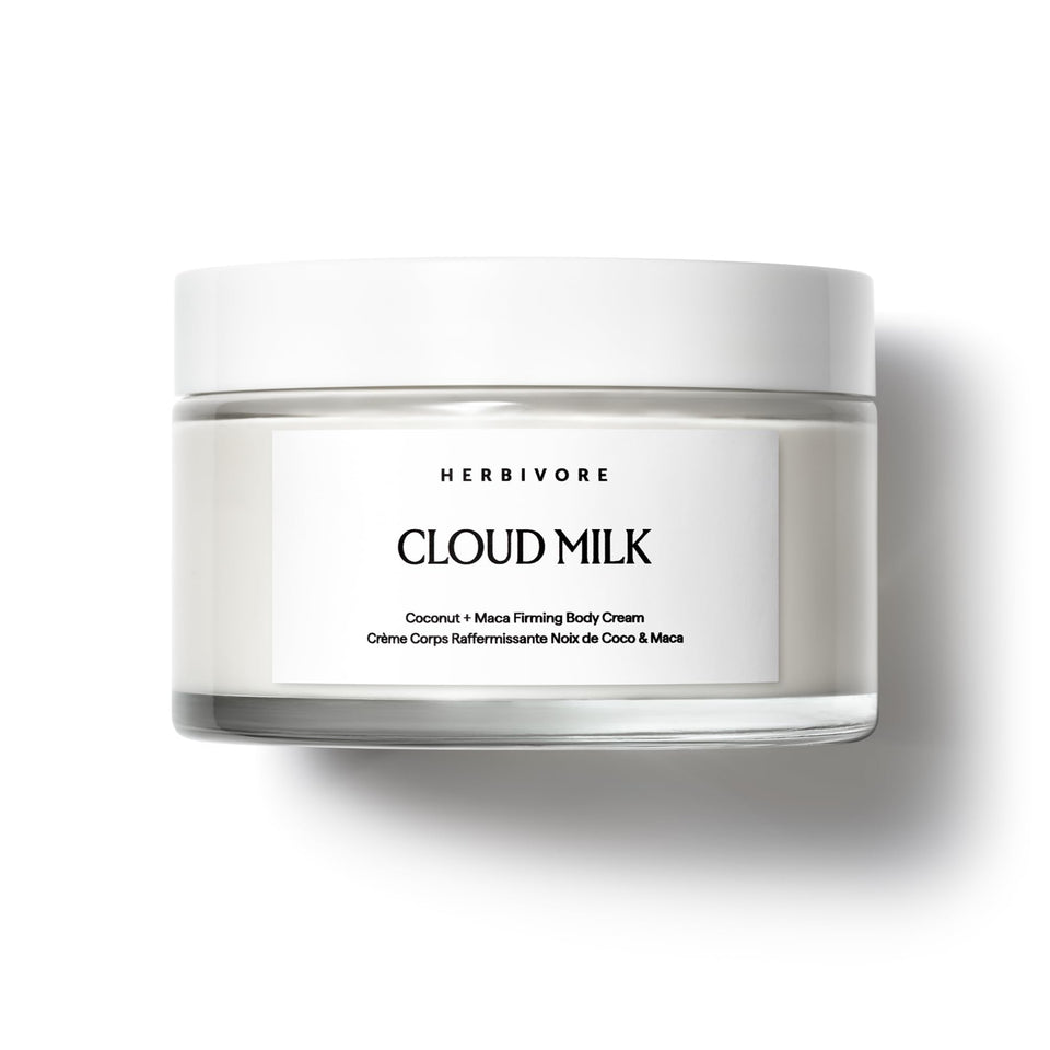 Herbivore Cloud Milk Coconut Maca Cream bottle delivering rich hydration for all skin types.