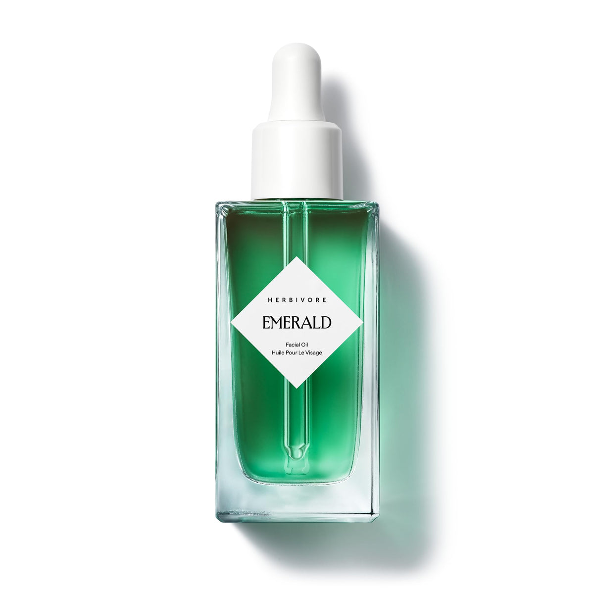 HERBIVORE Emerald Facial Oil bottle front, showcasing calming, hydrating formula for stressed skin.