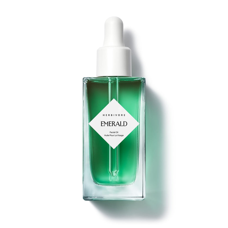 HERBIVORE Emerald Facial Oil bottle front, showcasing calming, hydrating formula for stressed skin.