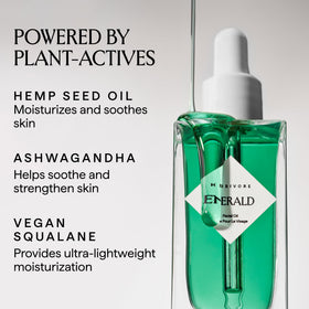 HERBIVORE Emerald Facial Oil texture close-up, indicating silky application and soothing skin comfort.