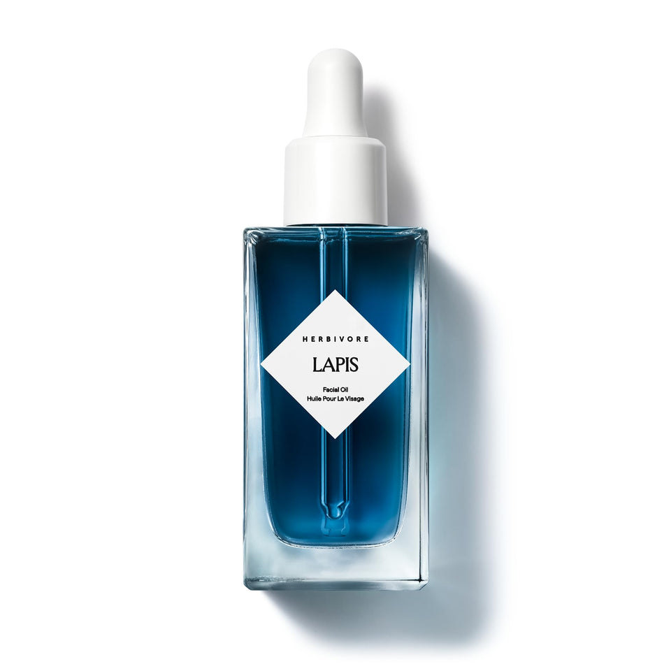 HERBIVORE Lapis Blue Tansy Oil bottle pour for balanced hydration