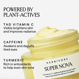 HERBIVORE Super Nova Eye Cream being applied with ring finger for gentle de-puffing.