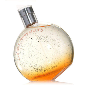 Hermès Eau Des Merveilles for Women bottle closeup emphasizes shimmering notes and refined elegance.
