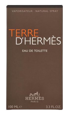 Hermès Terre d’Hermès mineral flint accent evokes earthiness and calm focus.