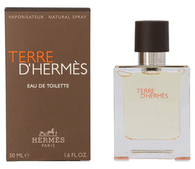 Hermès Terre d'Hermès wooden cap detail conveys rugged refinement.