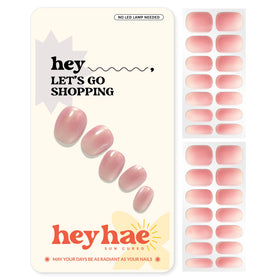 Heyhae semi-cured nail strips with glitter-rose-pink finish for easy at-home glam.