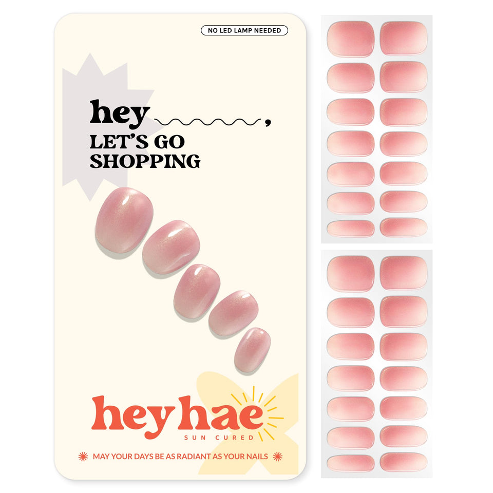 Heyhae semi-cured nail strips with glitter-rose-pink finish for easy at-home glam.
