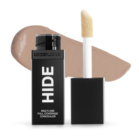 Hide multi-use concealer bottle close-up showing creamy coverage for blemishes