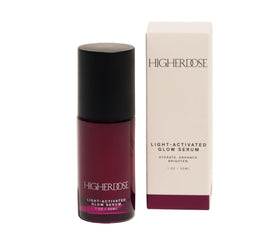 HigherDOSE Glow Serum bottle top glistening, emphasizing hydration