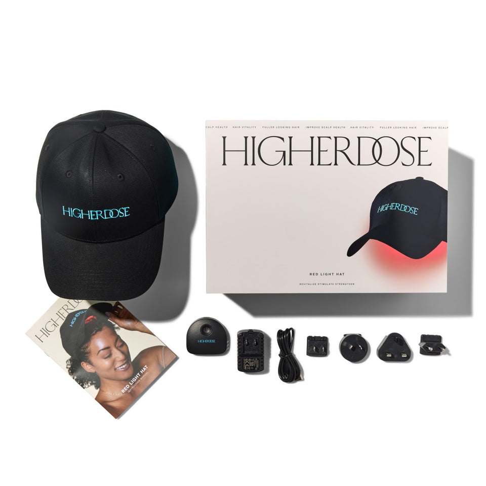 HigherDOSE red light hat on head for scalp wellness and fuller-looking hair.