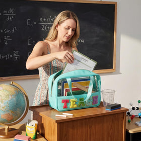Hillban TEACH clear tote with black patch for color-coded travel organization.