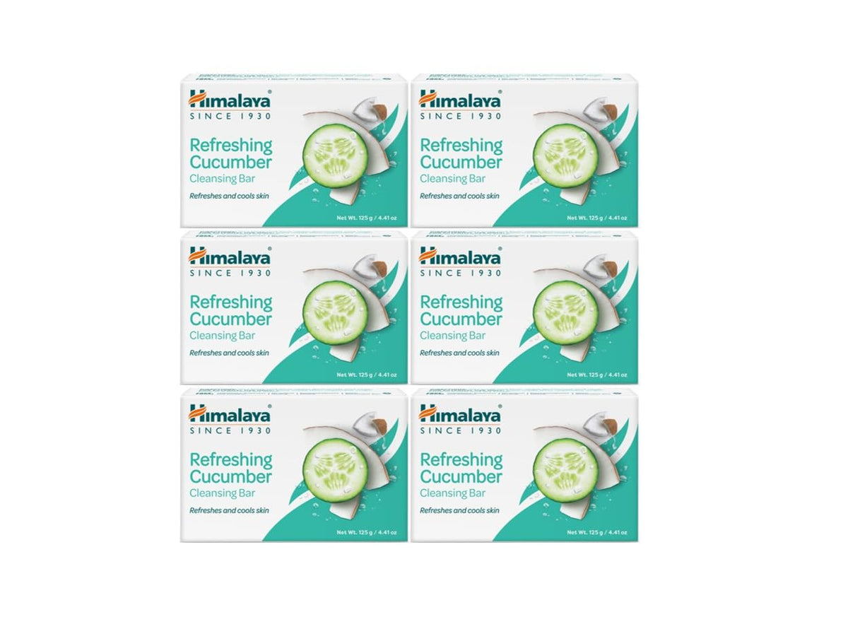 Himalaya Cucumber Cleansing Bar in hand, offering refreshing cleansing for soft, hydrated skin.