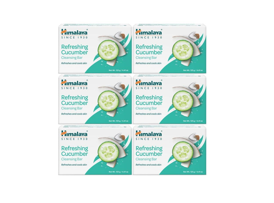 Himalaya Cucumber Cleansing Bar in hand, offering refreshing cleansing for soft, hydrated skin.