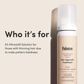 Applying foam to the hair loss area with fingertips