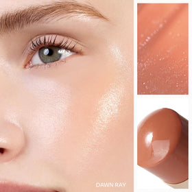 HINCE True Dimension Radiance Balm on brow bone for bright lift.