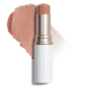 HINCE True Dimension Radiance Balm on cheekbones for glass-skin glow.