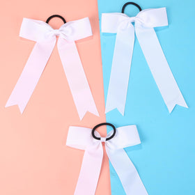 Hipcheer teen cheer bow with wrapped elastic for secure ponytail wear.