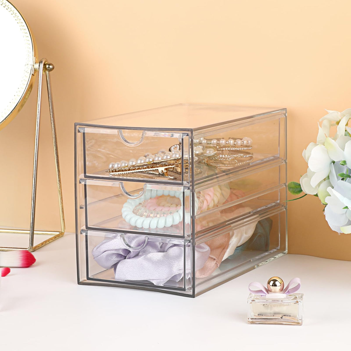 Hipiwe hair accessory drawer neatly stores ties and clips within reach.