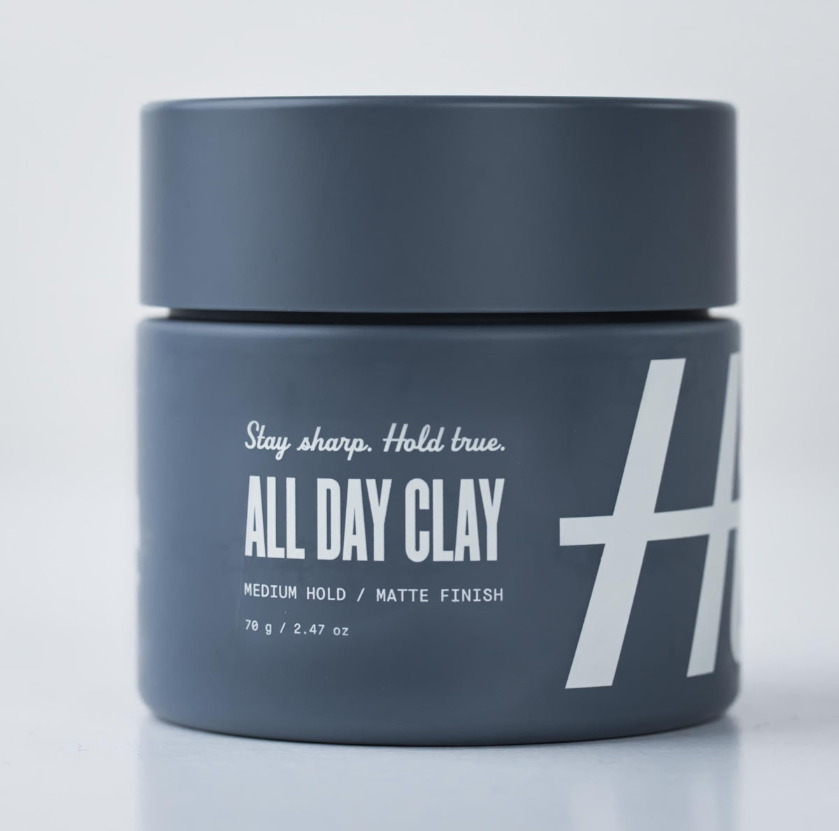 Hitch All Day Clay supports all hair types with versatile hold.