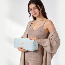 HiTotes foldable design shown with suitcase for compact packing