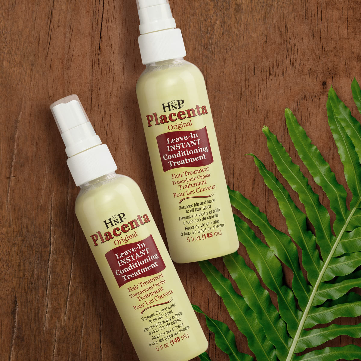 HNP Placenta Original leave-in conditioner bottle closeup highlighting smooth detangling