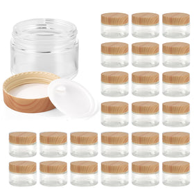 Hoa Kinh 1oz glass jar with woodgrain lid for travel storage.